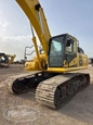 Used Excavator under sky